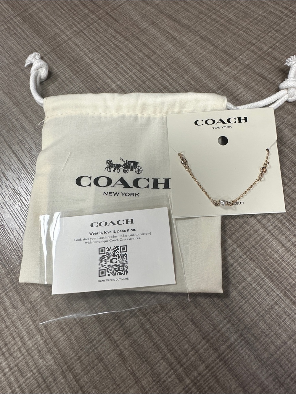 Coach Gold Tone Chain Bracelet with Crystal Accent